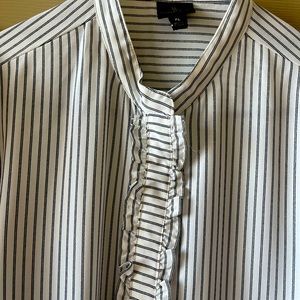 Business type shirt looks great under a black jacket